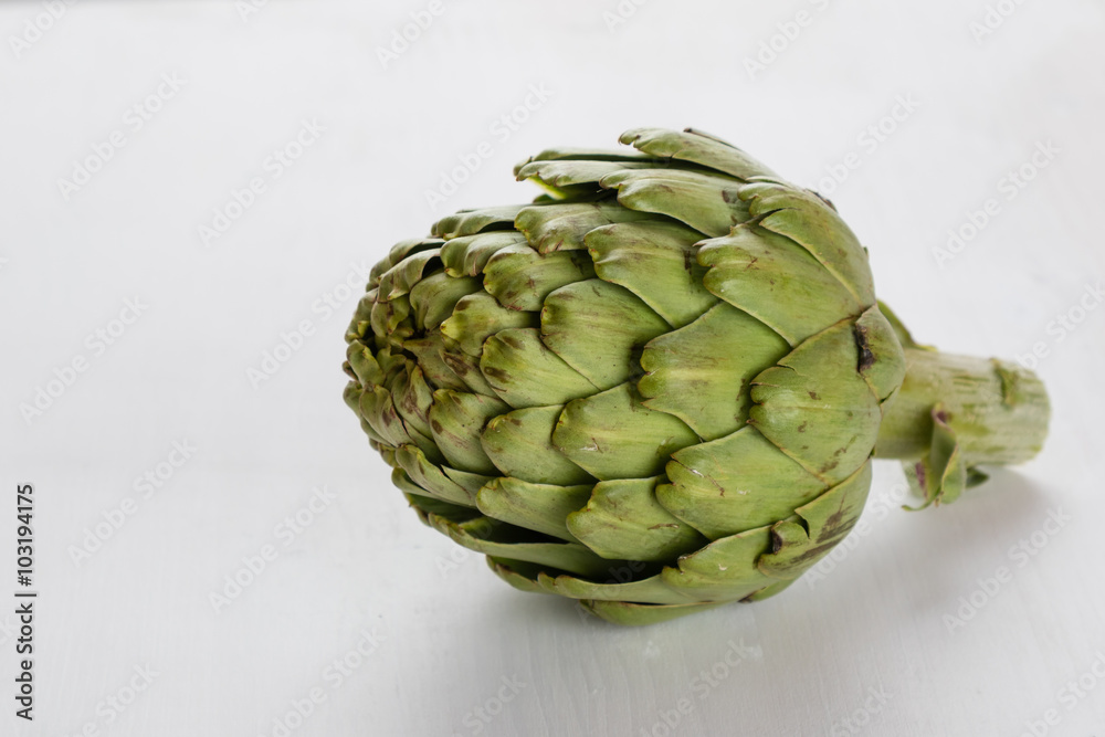 Obraz premium artichoke on white table