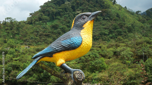 Cosanga, Napo / Ecuador - January 16 2016: Sculpture bird with yellow breast in the town of Cosanga photo