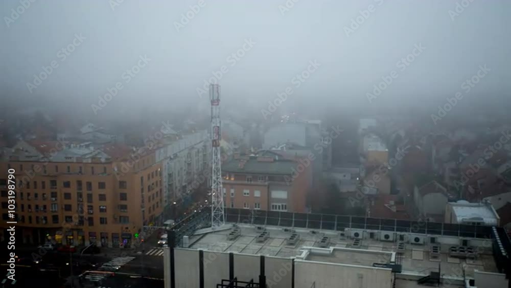 Dramatic fog completely covering the intersection timelapse day to night Dramatic fog completely covering the intersection timelapse day to night