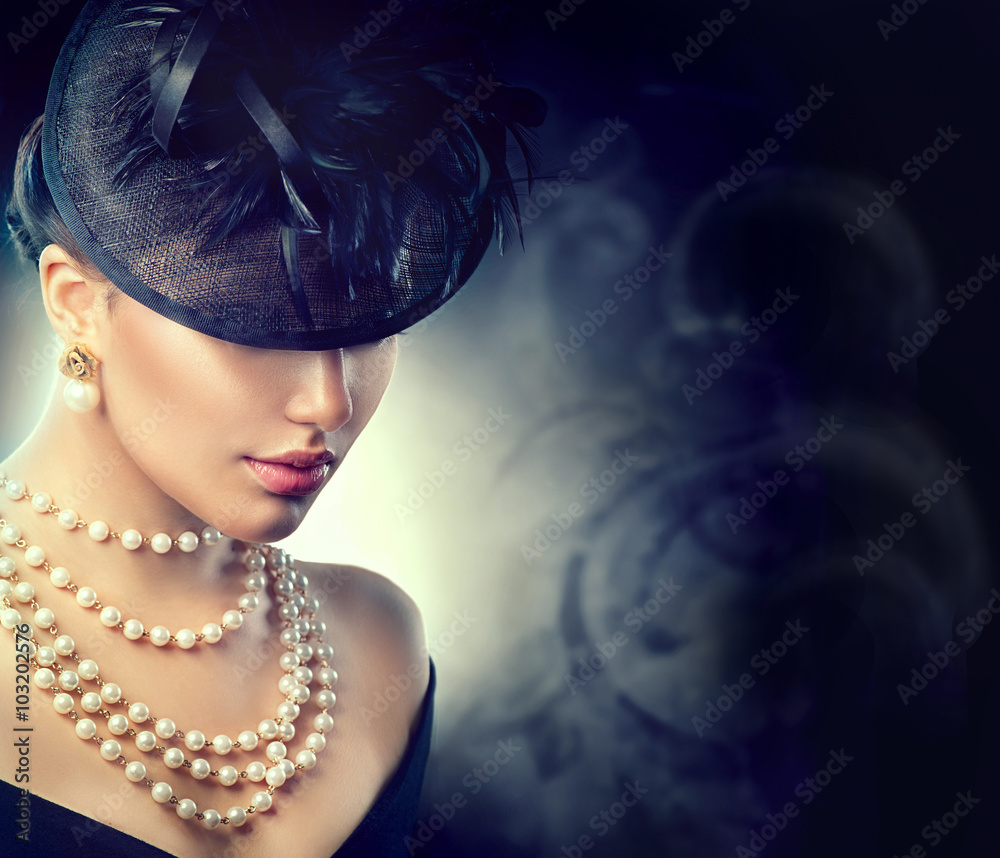 Retro woman portrait. Vintage style girl wearing old fashioned hat