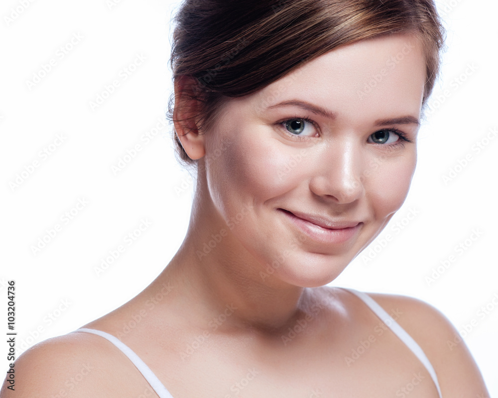 Beautiful face of young adult woman with clean fresh skin - isolated on white Beautiful face of young adult woman with clean fresh skin - isolated on white