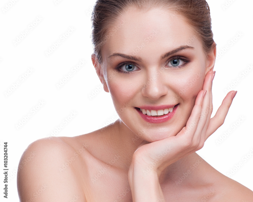 Beautiful face of young adult woman with clean fresh skin - isolated on white Beautiful face of young adult woman with clean fresh skin - isolated on white