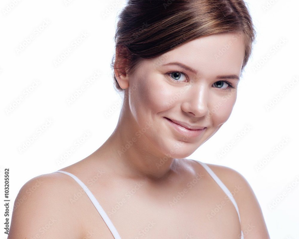 Beautiful face of young adult woman with clean fresh skin - isolated on white Beautiful face of young adult woman with clean fresh skin - isolated on white
