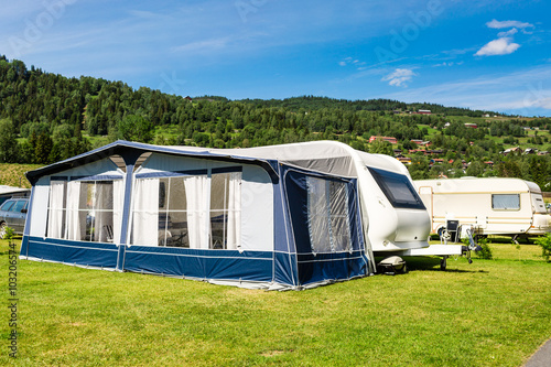Modern caravan at camping site