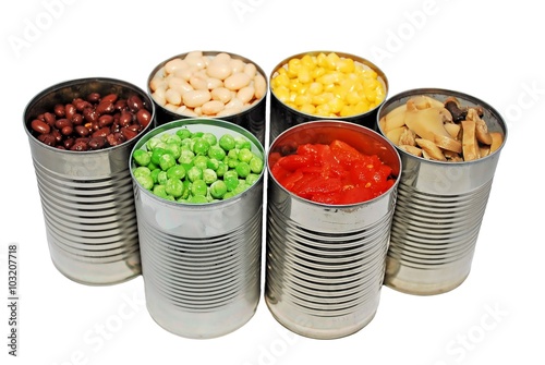 Selective focus of opened cans of vegetables