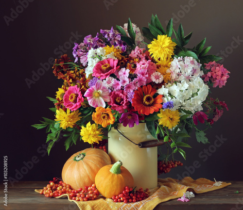 Autumn still life with a bouquet of garden flowers