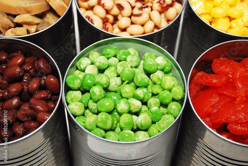 Close up of opened cans of vegetables