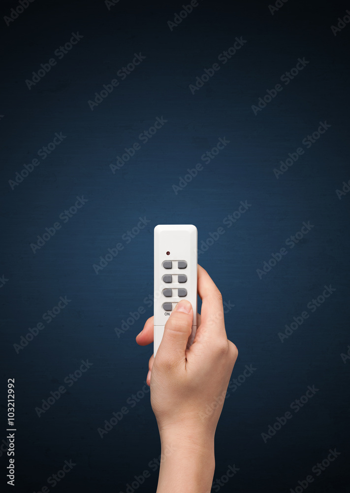 Hand with remote control Hand with remote control