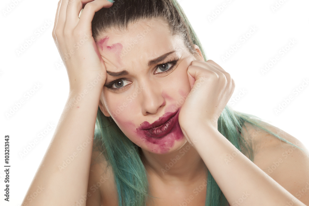 Naklejka premium desperate young woman with smeared makeup