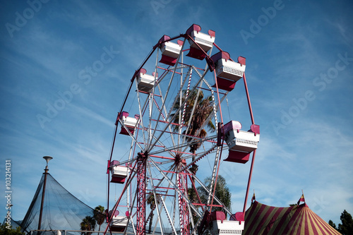 Photography aged and worn vintage photo of ferris wheel