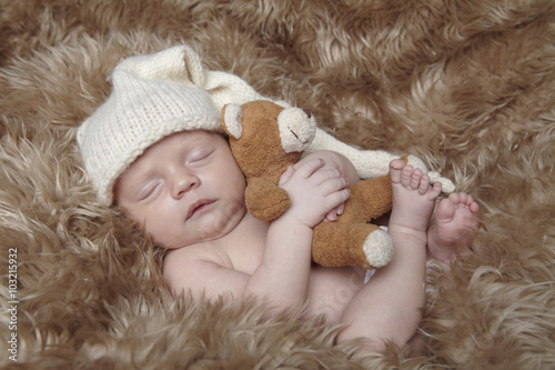 baby and teddy bear