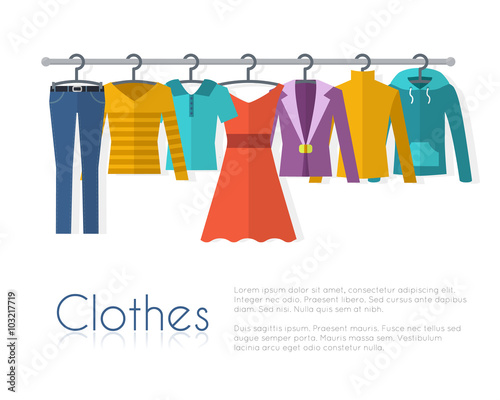 Racks with clothes on hangers.