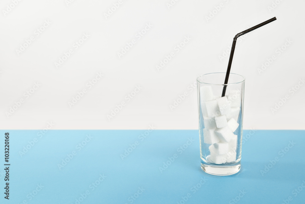 Glass of sugar, diabetes disease, sweet addiction Glass of sugar, diabetes disease, sweet addiction