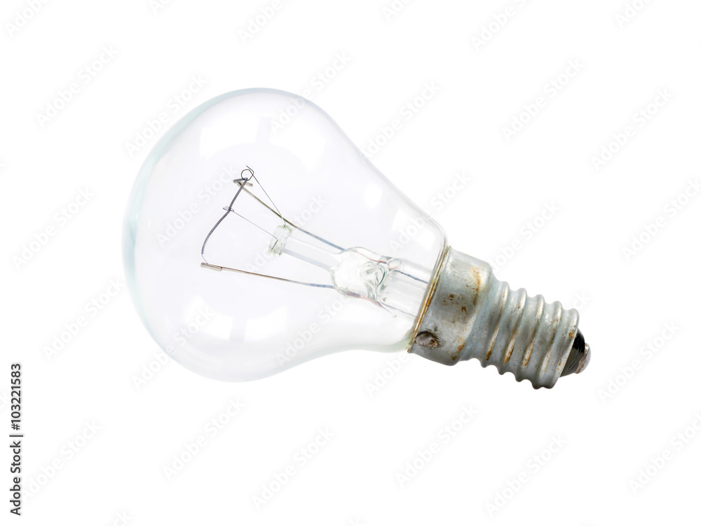 The old incandescent light bulb with tungsten spiral The old incandescent light bulb with tungsten spiral