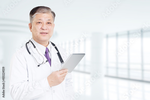 pose and gesture of old Asian man doctor in white