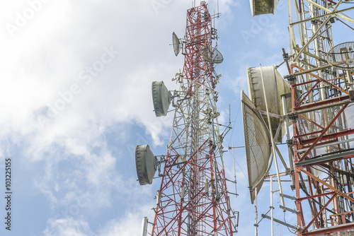 Telecommunication mast TV antennas with blue sky in the morning