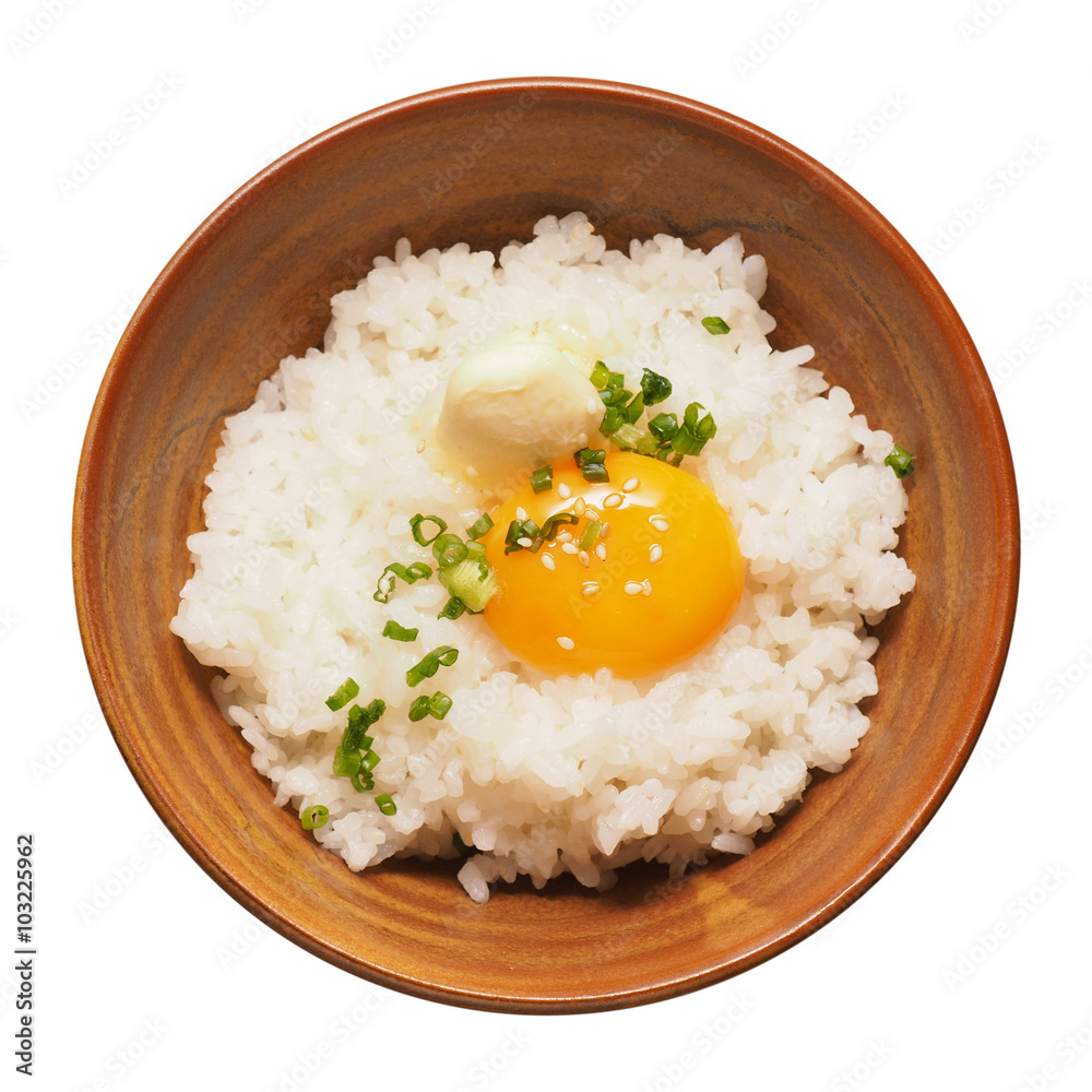 Warm rice with egg york isolated on white Warm rice with egg york isolated on white