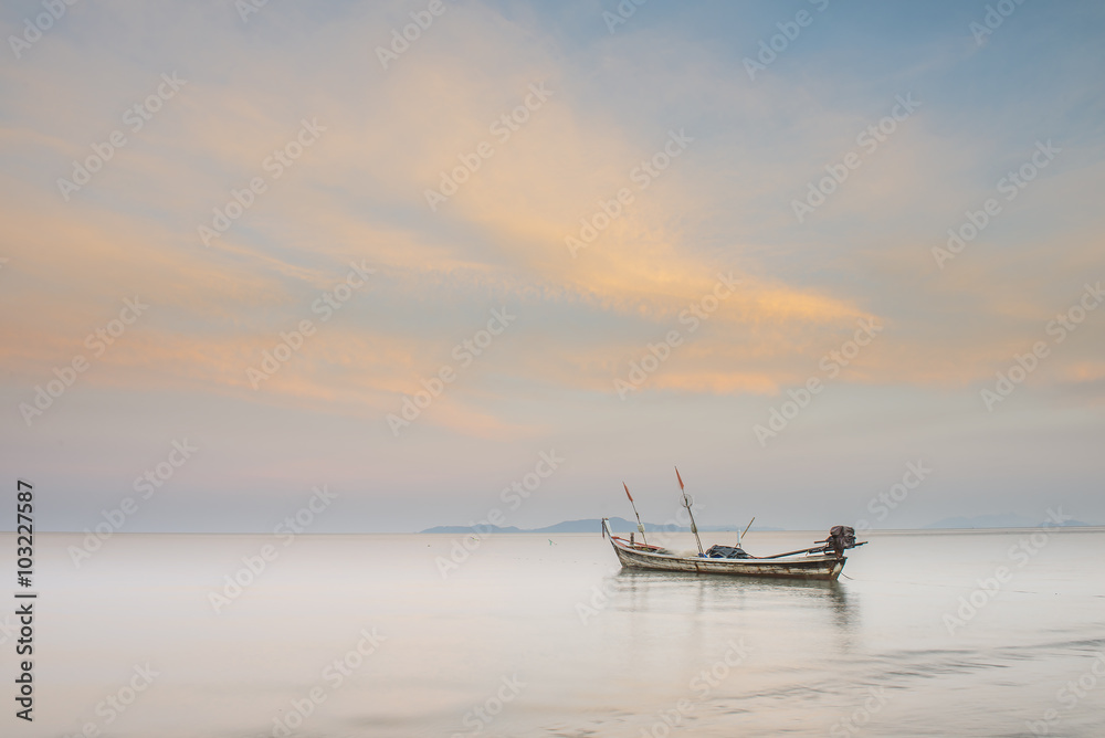 Andaman Sea at sunrise with Small boat Andaman Sea at sunrise with Small boat