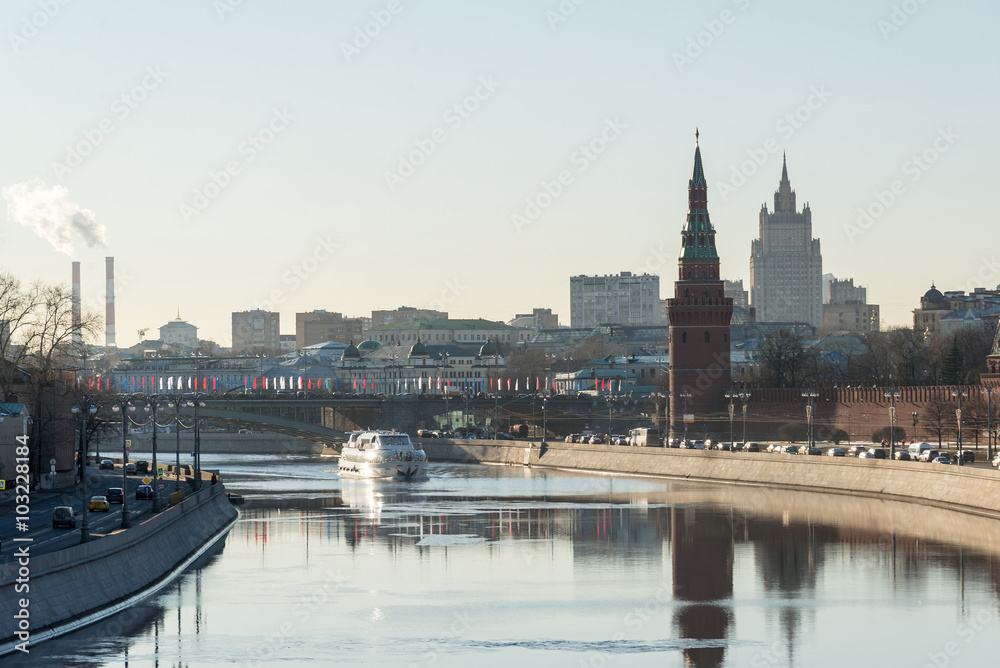  The ship floats on  river near  Kremlin