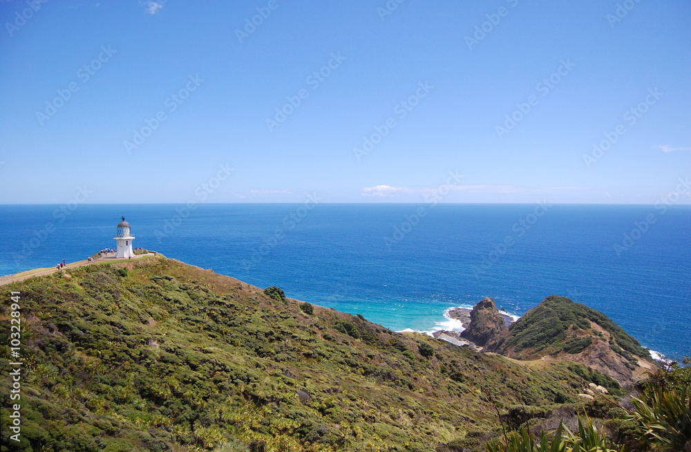 Cape Reinga lighthouse hilly sea coast