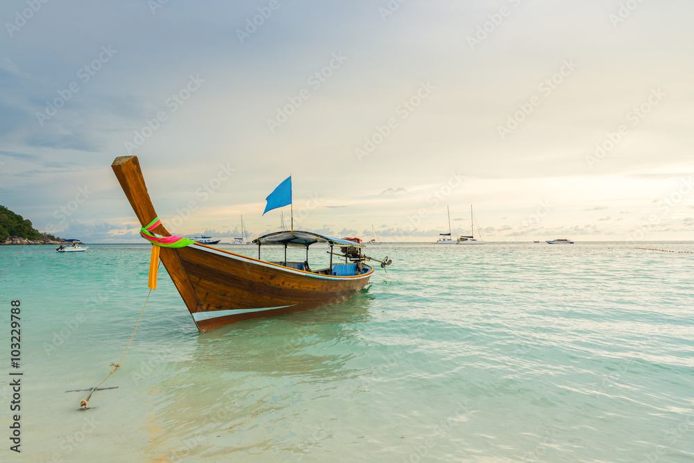 Long tail boats lined along the beach in Koh Lipe island in Thailand