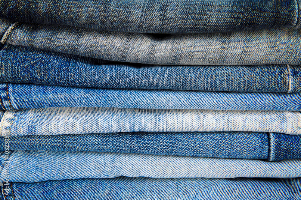 Jeans trousers stack closeup.