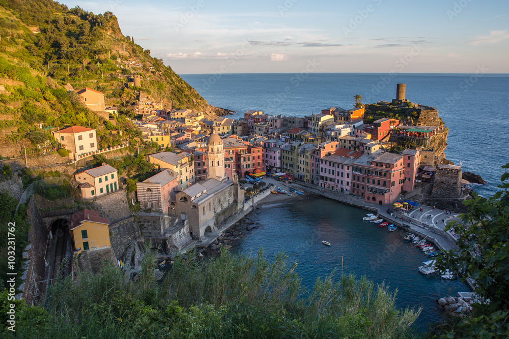 Sunset view of colorful houses and the harbor in Vernazza, Cinque Terre, Liguria, Italy (May 4, 2014)