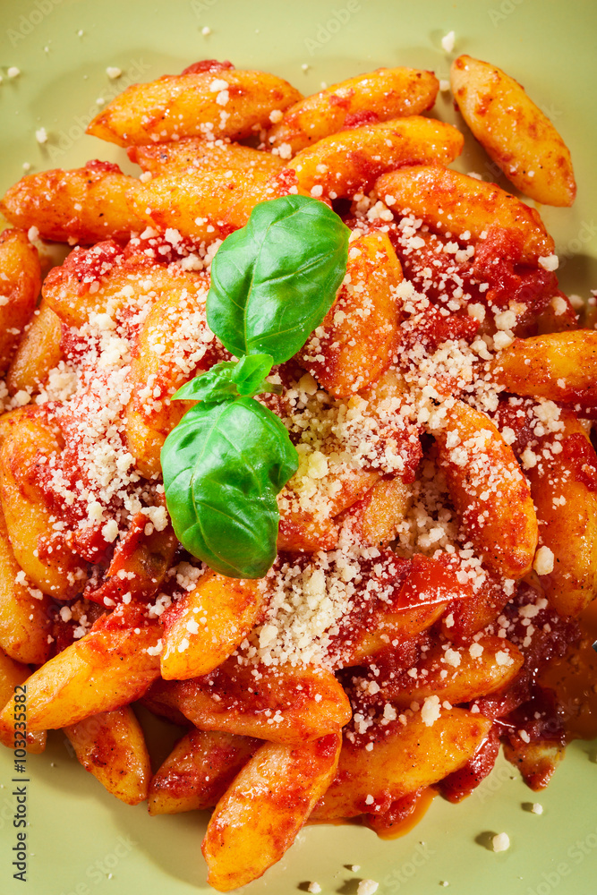 Italian gnocchi with tomato sauce and cheese Italian gnocchi with tomato sauce and cheese