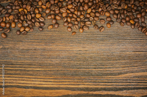 Coffee beans background. Roasted coffee. Top view. Selective focus. Place for text