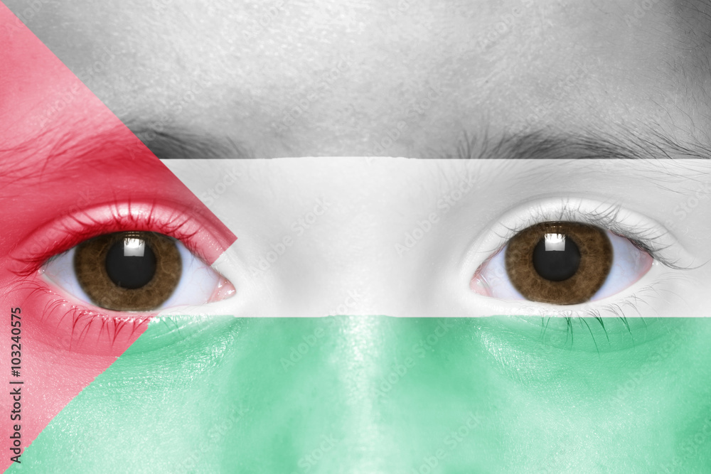 Obraz premium human's face with palestinian flag