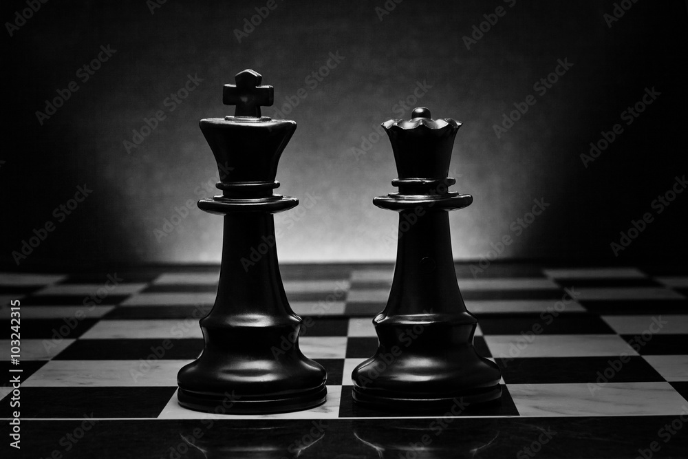 Chess. Black King and Queen on the board .The most powerful