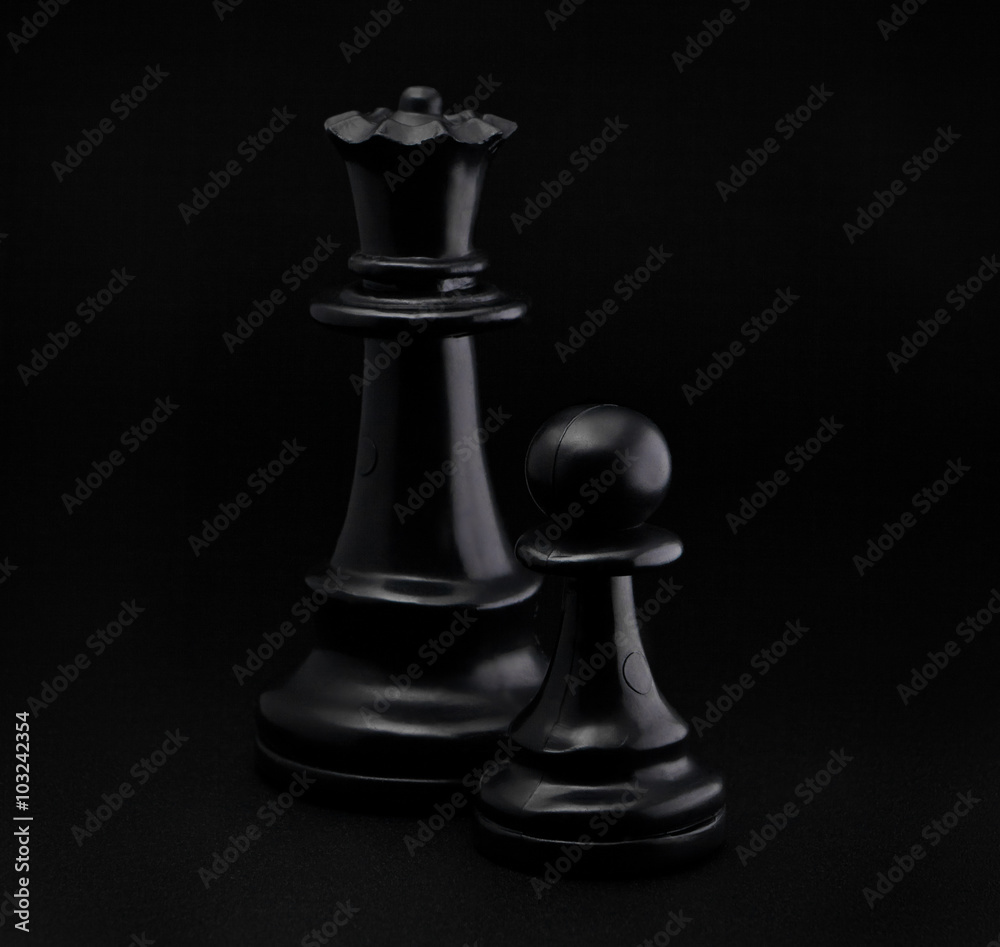 Chess. Black Pawn and Queen on black background. Chess. Black Pawn and Queen on black background.