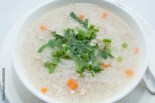 Boiled rice pork or mush for breakfast.