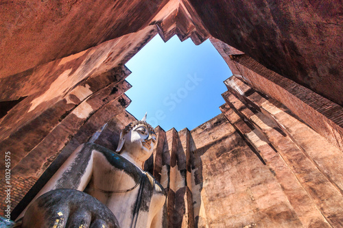 Ancient buddha statue at Sukhothai historical park, Thailand