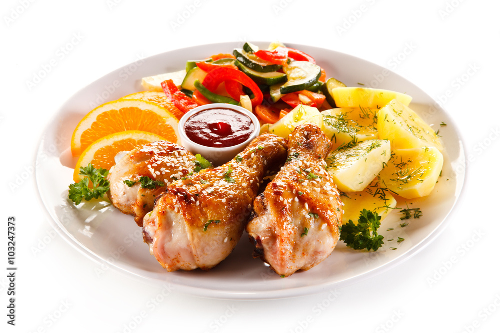 Grilled chicken legs with boiled potatoes and vegetables Grilled chicken legs with boiled potatoes and vegetables