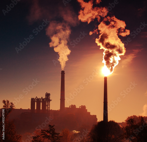 Power station with smoking chimney