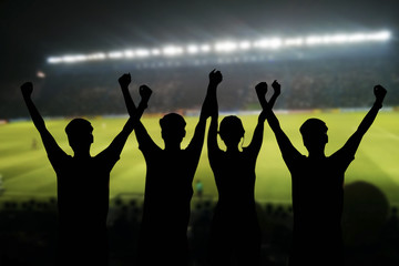 silhouettes of Soccer fans in a match and Spectators at football