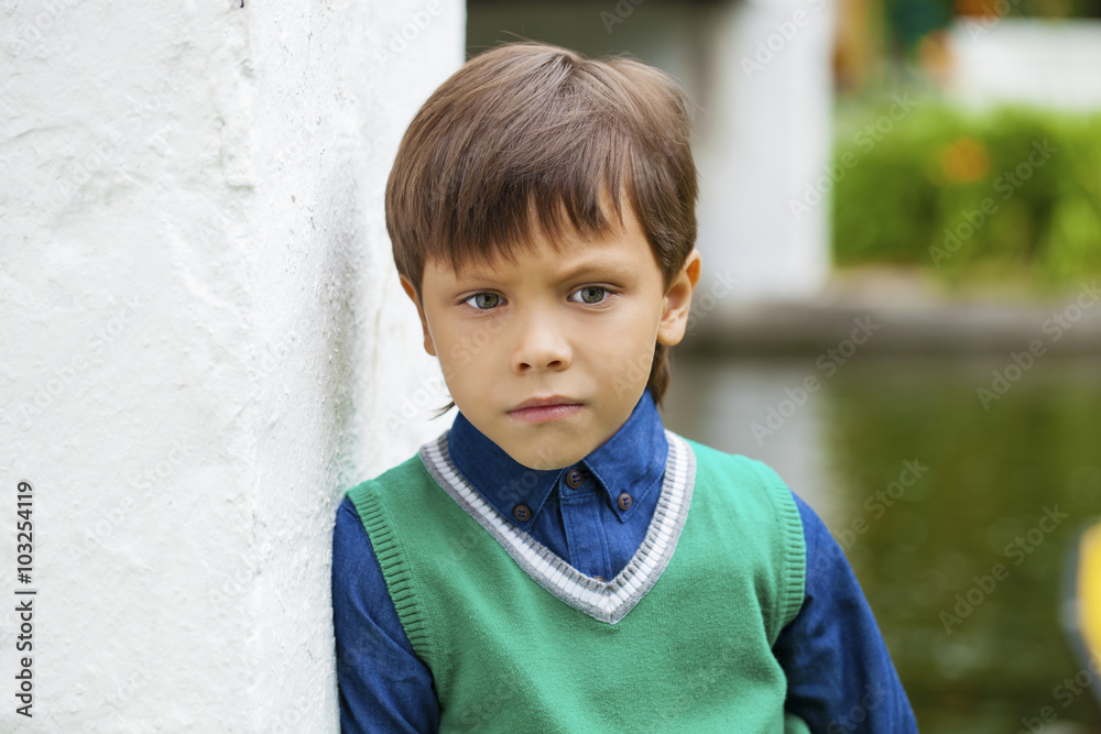 Fashionable little boy outdoor at the nice summer day Fashionable little boy outdoor at the nice summer day