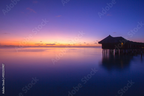 TWO SKY'S NEXT TO WATER BUNGALOW. Few clouds on the sky and a flat sea conditions, crate a beautiful sunset like this.