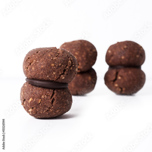Italian cookies called baci di dama made with nuts and chocolate