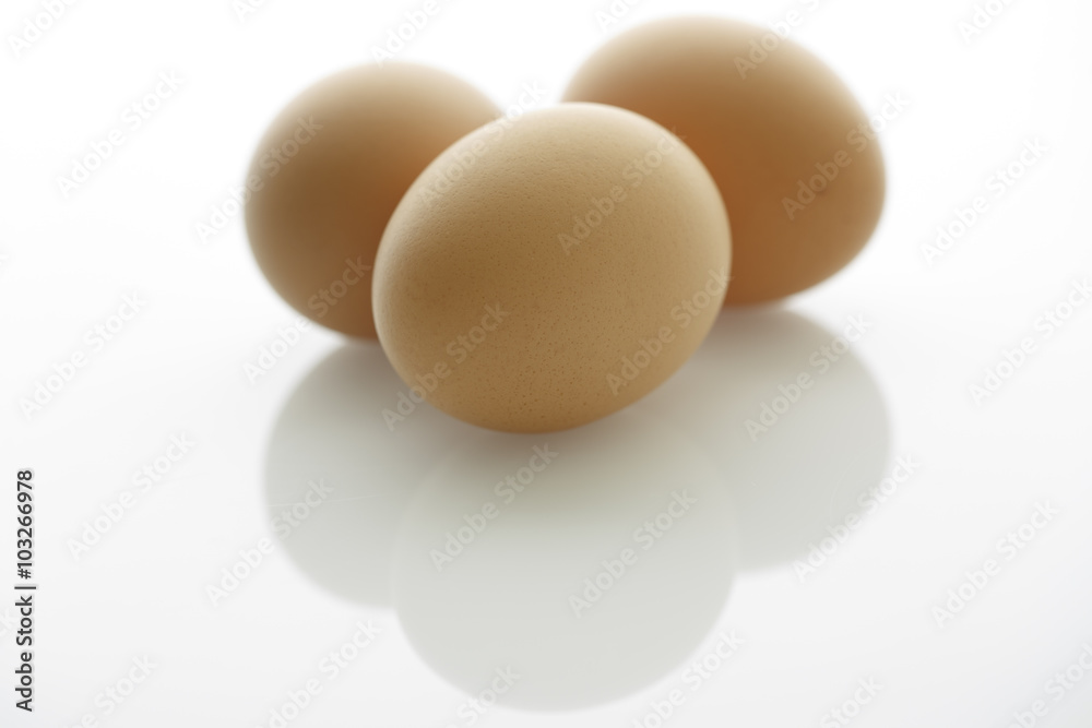 Three Brown Eggs