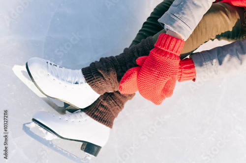 Tilted blue version, ice skates with reflection photo