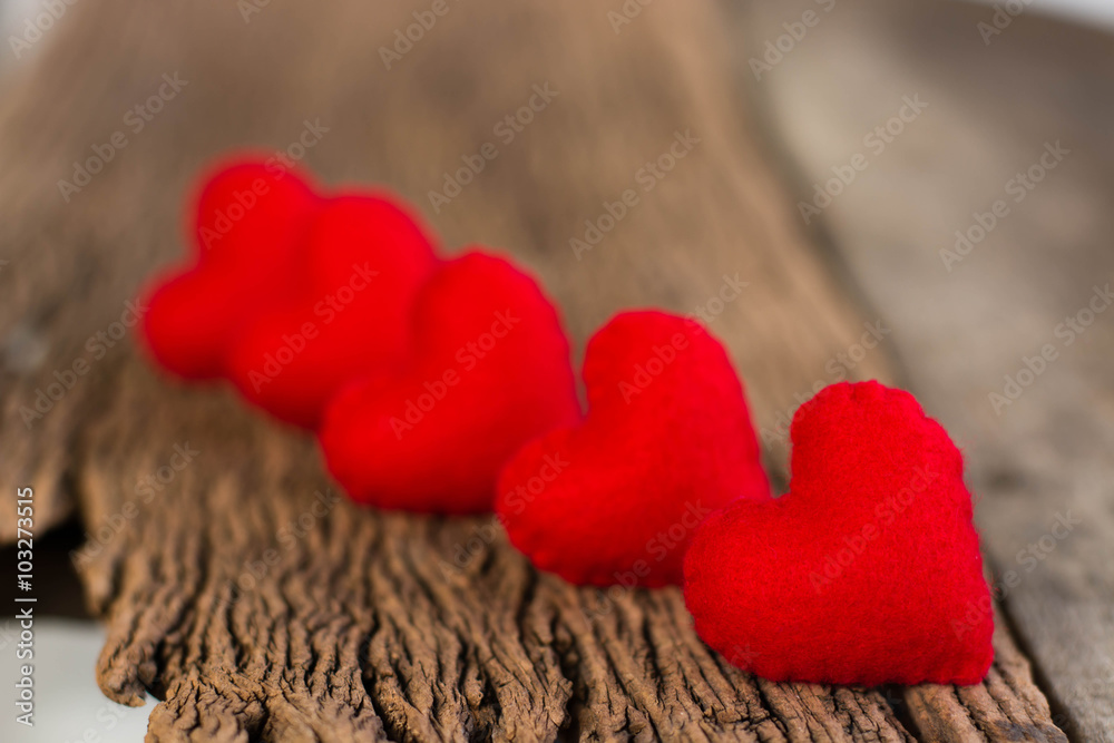 Fototapeta premium Valentines Day background with Red Hearts on old vintage wooden