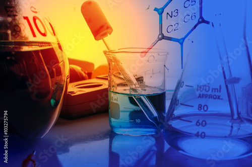 Double exposure of scientist and test tubes, laboratory concept