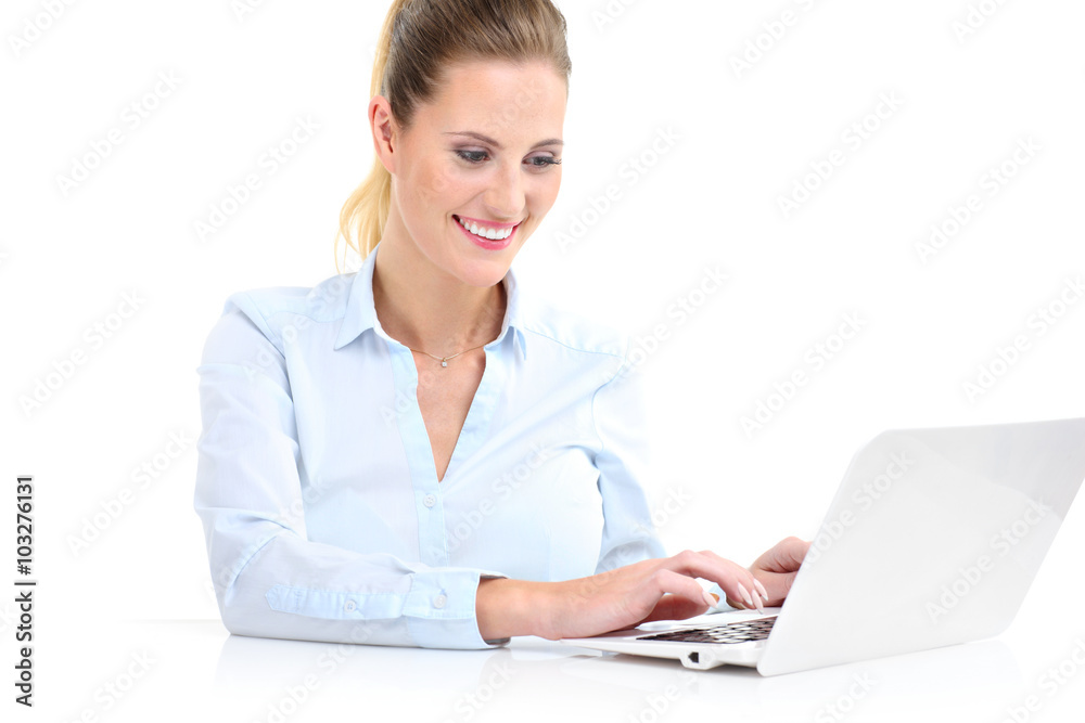Businesswoman working on laptop Businesswoman working on laptop