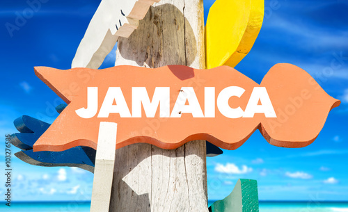 Jamaica welcome sign with beach photo