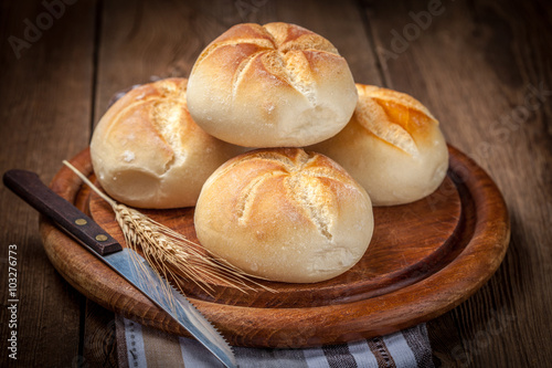 Several kaiser rolls.