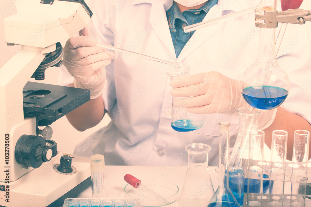 scientist with equipment and science experiments scientist with equipment and science experiments