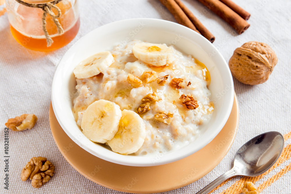 oatmeal porridge with banana, nuts and honey oatmeal porridge with banana, nuts and honey