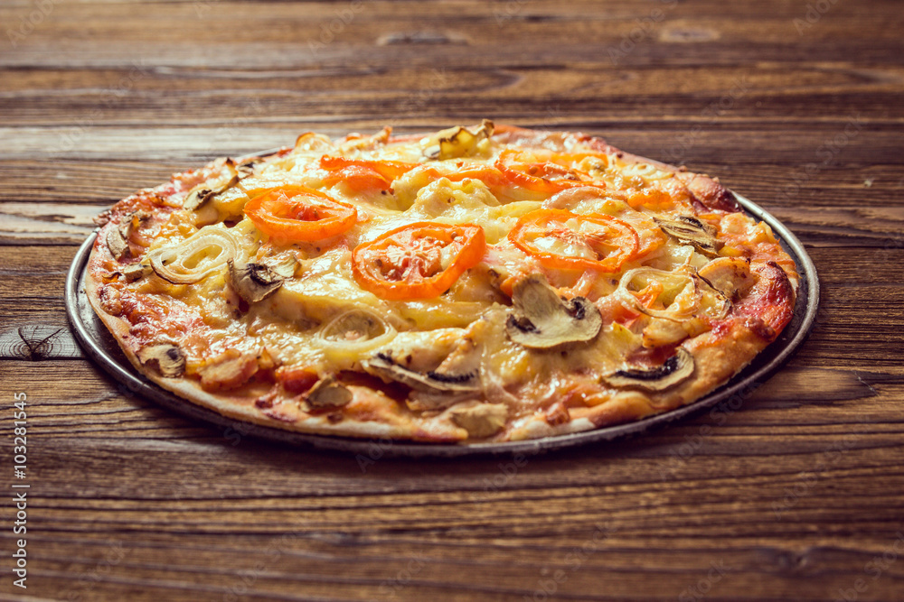 Pizza on a wooden table